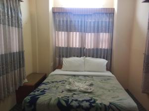 Katil atau katil-katil dalam bilik di Hotel Celestyinn