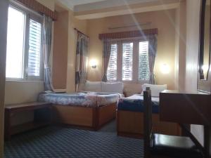 Katil atau katil-katil dalam bilik di Hotel Celestyinn
