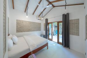 Imagen de la galería de Brickwood Rasdhoo- Beach front, en Rasdu