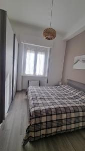 Ένα ή περισσότερα κρεβάτια σε δωμάτιο στο Ca'VI comfortable and cute house +13 φωτογραφίες