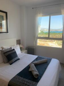 Postel nebo postele na pokoji v ubytování Cabo Mar