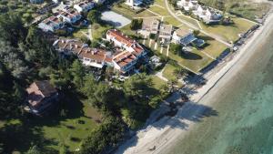 an aerial view of a house next to the beach at House Soko - 30m to Beach, near Mako and Elephant beach bar in Pefkohori
