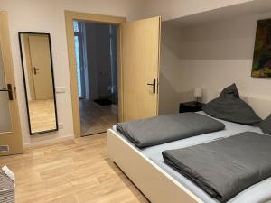Postel nebo postele na pokoji v ubytování Terassenwohnung in Weilerbach