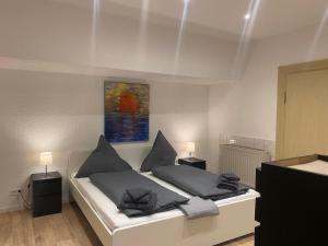 Postel nebo postele na pokoji v ubytování Terassenwohnung in Weilerbach