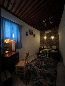 Postel nebo postele na pokoji v ubytování House andalous