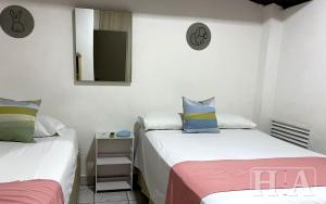Postel nebo postele na pokoji v ubytování Hospedaje Aldana - Apartamento AMAL zona centro