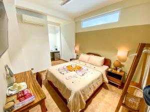 Postel nebo postele na pokoji v ubytování Muni Residence & Spa + 31 fotografií