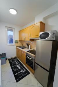 Kuchyň nebo kuchyňský kout v ubytování Martinovics Hévíz Apartman