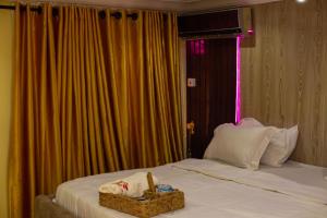A bed or beds in a room at Diganga Reloaded