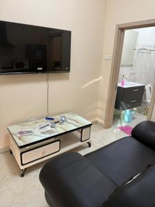 TV a/nebo společenská místnost v ubytování Gam Properties Guest House