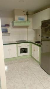 Kuchnia lub aneks kuchenny w obiekcie Apartamentos Dunamar