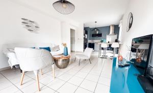 Kuchyňa alebo kuchynka v ubytovaní Bel appartement climatisé & parking