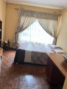 En eller flere senge i et værelse på Majestic Marlborough