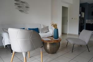 Posedenie v ubytovaní Bel appartement climatisé & parking