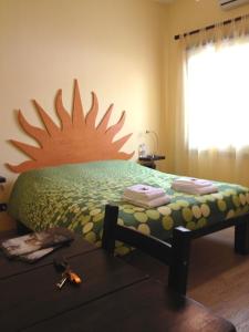 מיטה או מיטות בחדר ב-B&B San Leone