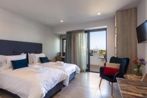 A bed or beds in a room at Lines Concept Accommodation
