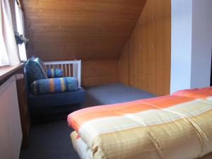 Postel nebo postele na pokoji v ubytování Guest House U Lakomce