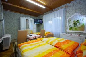 Posteľ alebo postele v izbe v ubytovaní Amália Apartman