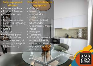 a kitchen with white cabinets and a table and chairs at Amazinn Places EVI Apartments in Valencia +232 photos