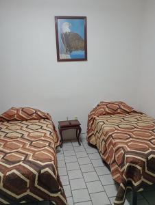 Postel nebo postele na pokoji v ubytování Departamento el REPOSO + 8 fotografií