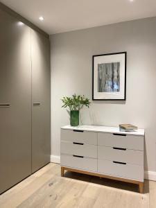 luxury dresser london Michael Amini London Place 6-Drawer Dresser in Creamy Pearl with Cultured  Marble Top