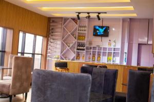 A television and/or entertainment centre at Diganga Reloaded