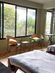 Postel nebo postele na pokoji v ubytování Arranque Jungle & Pool Apartment Cerro Azul Panama