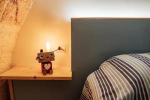 Ένα ή περισσότερα κρεβάτια σε δωμάτιο στο Avita Mare