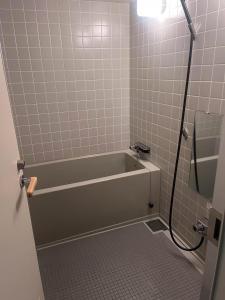 Koupelna v ubytování Tomamu Hostel