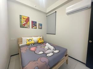 Tom and Jerry Suite with Infinity Pool客房内的一张或多张床位