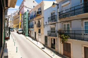 a view of a city street with buildings at Lisbon Sant'Ana Alcantara 2br apart in Lisbon