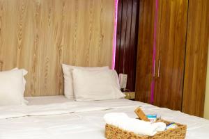 A bed or beds in a room at Diganga Reloaded