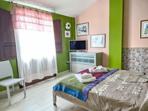 Postel nebo postele na pokoji v ubytování Sa Mirada Apartments
