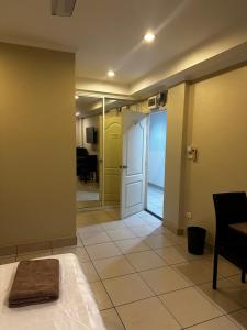 a room with a hallway with a door and a floor at Home Sweet Home 3 in Pattaya South