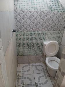 Koupelna v ubytování Hostel Tayane de Cássia