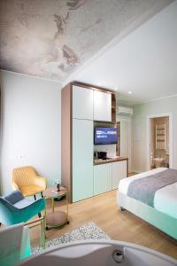 Postel nebo postele na pokoji v ubytování Rome suite Rome Vaticano Guest house + 46 fotografií