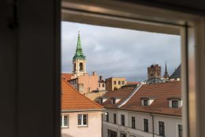 a view of a city from a window at Astronomica na Kopernika in Toruń +38 photos