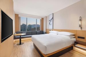 Ένα ή περισσότερα κρεβάτια σε δωμάτιο στο Fairfield by Marriott Hangzhou Yuhang +17 φωτογραφίες