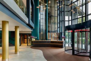 バドフーフェドルプにあるCorendon Amsterdam Schiphol Airport, a Tribute Portfolio Hotelの建物ロビーの景色