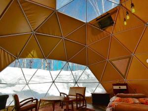 Posezení v ubytování 焚き火キャンプ場 Hokkaido Glamping - TAKIBI