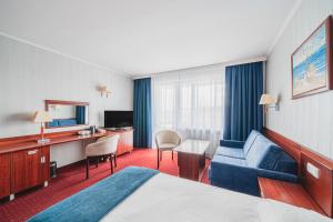 TV a/nebo společenská místnost v ubytování Hotel Lidia Spa & Wellness