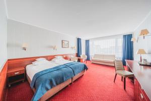 Postel nebo postele na pokoji v ubytování Hotel Lidia Spa & Wellness