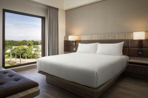 Voodi või voodid majutusasutuse AC Hotel by Marriott Punta Cana toas