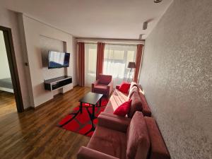 Μια τηλεόραση ή/και κέντρο ψυχαγωγίας στο Apartament Red
