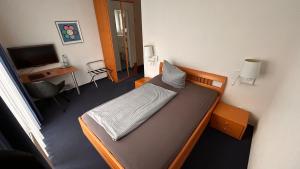 Postel nebo postele na pokoji v ubytování Hotel Gästehaus Linden