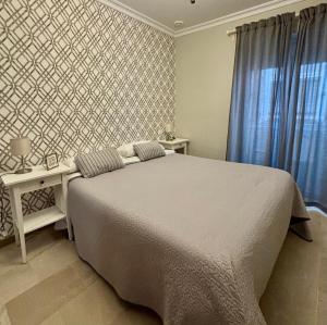 Postel nebo postele na pokoji v ubytování Apartamento FEDUCHY 10 min de la playa 2 baños