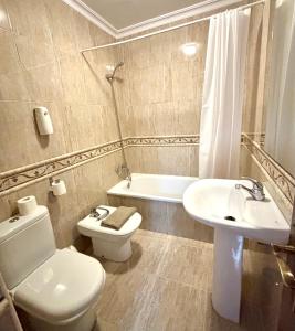Koupelna v ubytování Apartamento FEDUCHY 10 min de la playa 2 baños