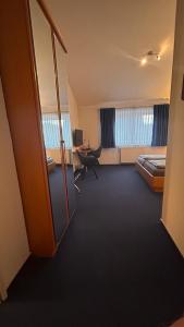 Postel nebo postele na pokoji v ubytování Hotel Gästehaus Linden