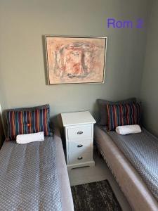 Postel nebo postele na pokoji v ubytování Just Like Home Bed & Spa Porsgrunn
