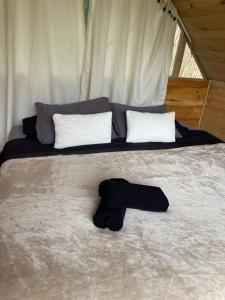 Postel nebo postele na pokoji v ubytování EKA Glamping